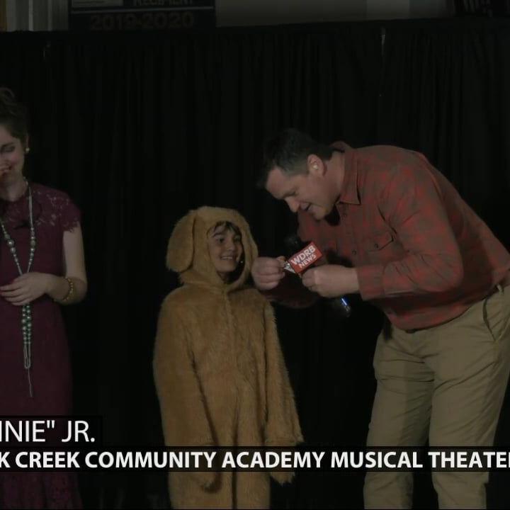 Keith Kaiser learns more about the production from a cast member